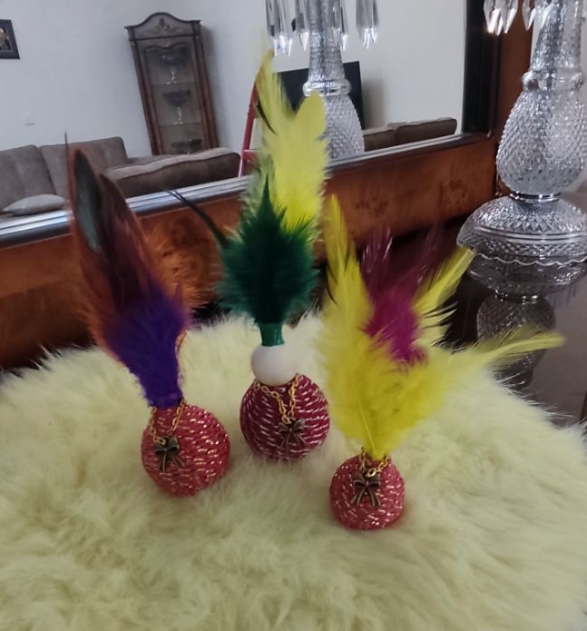 اسباب بازی چوبی توپ زنگوله دار پردار قیمت ۱۵۰